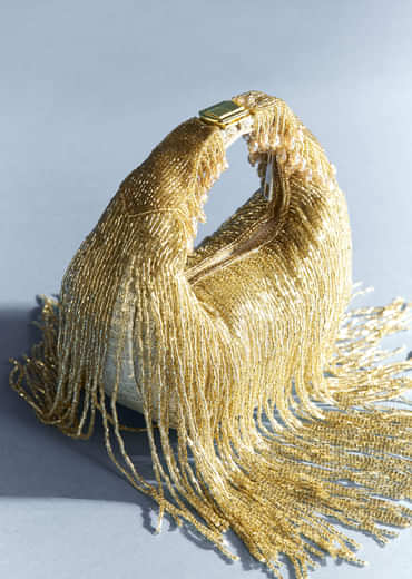 Gold Potli With Tassel Detailing