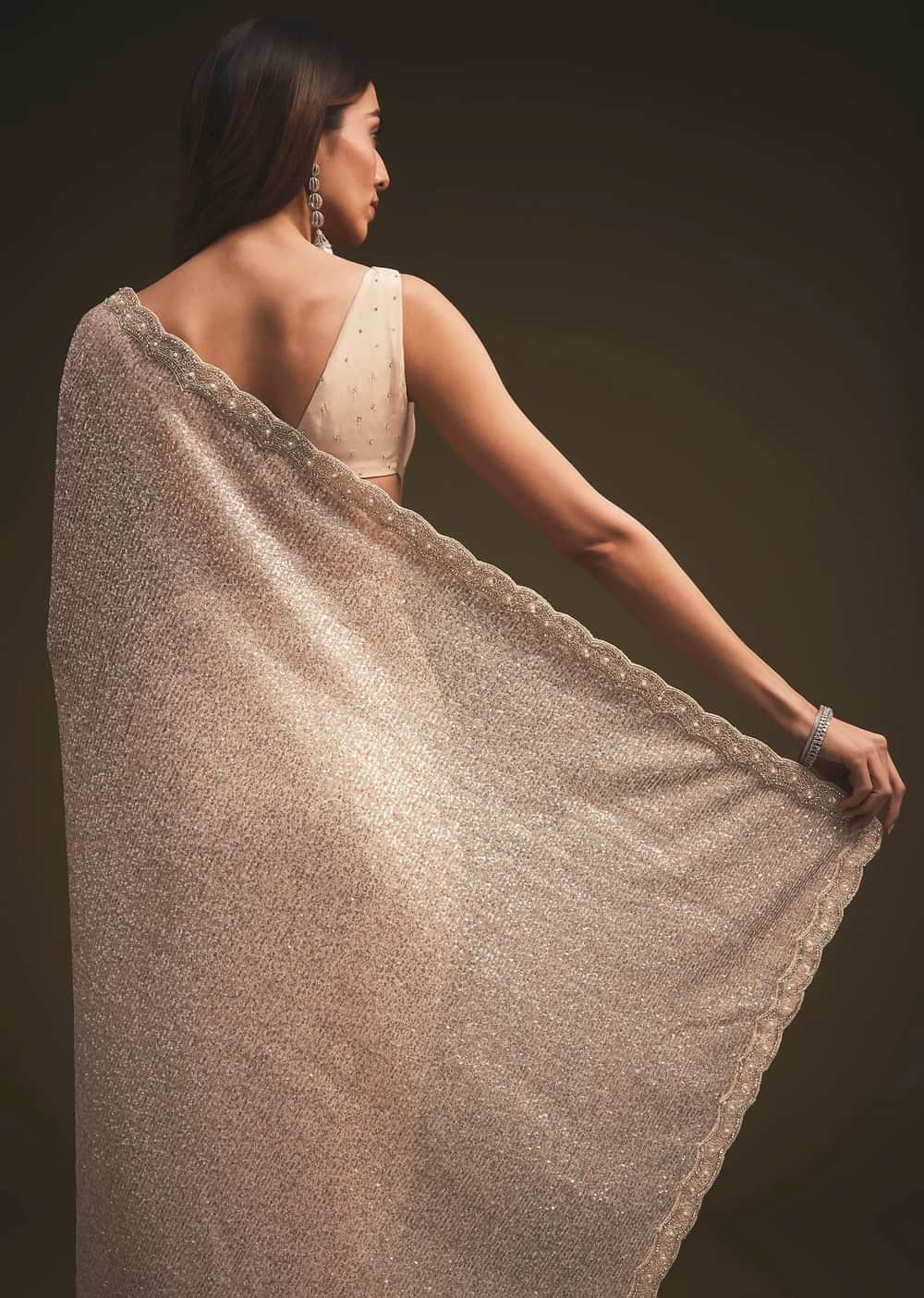 Gold Sequins Saree With An Embellished Border