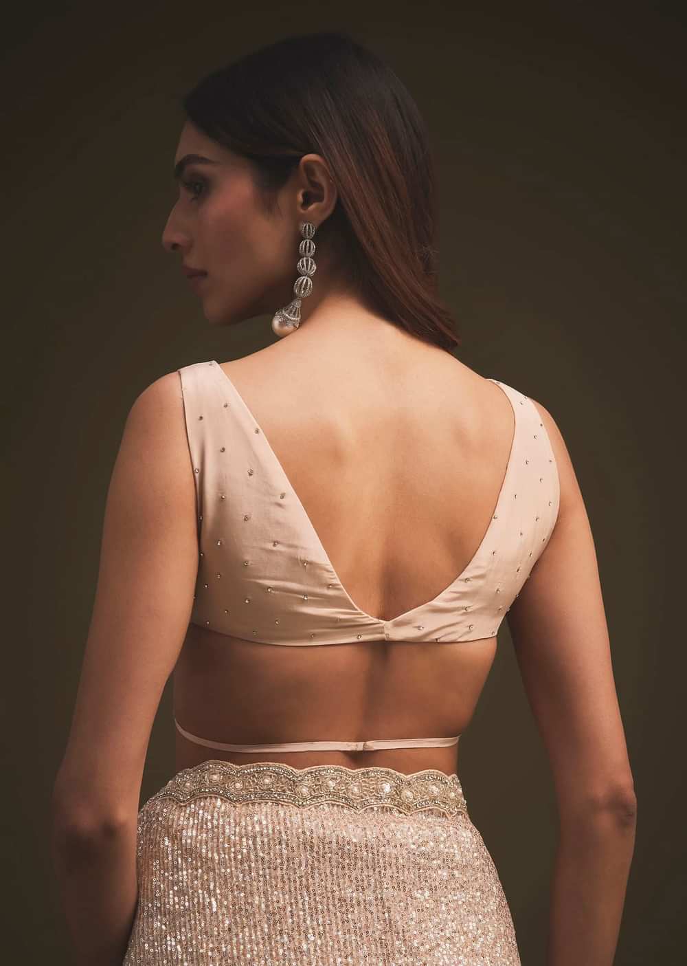Gold Sequins Saree With An Embellished Border