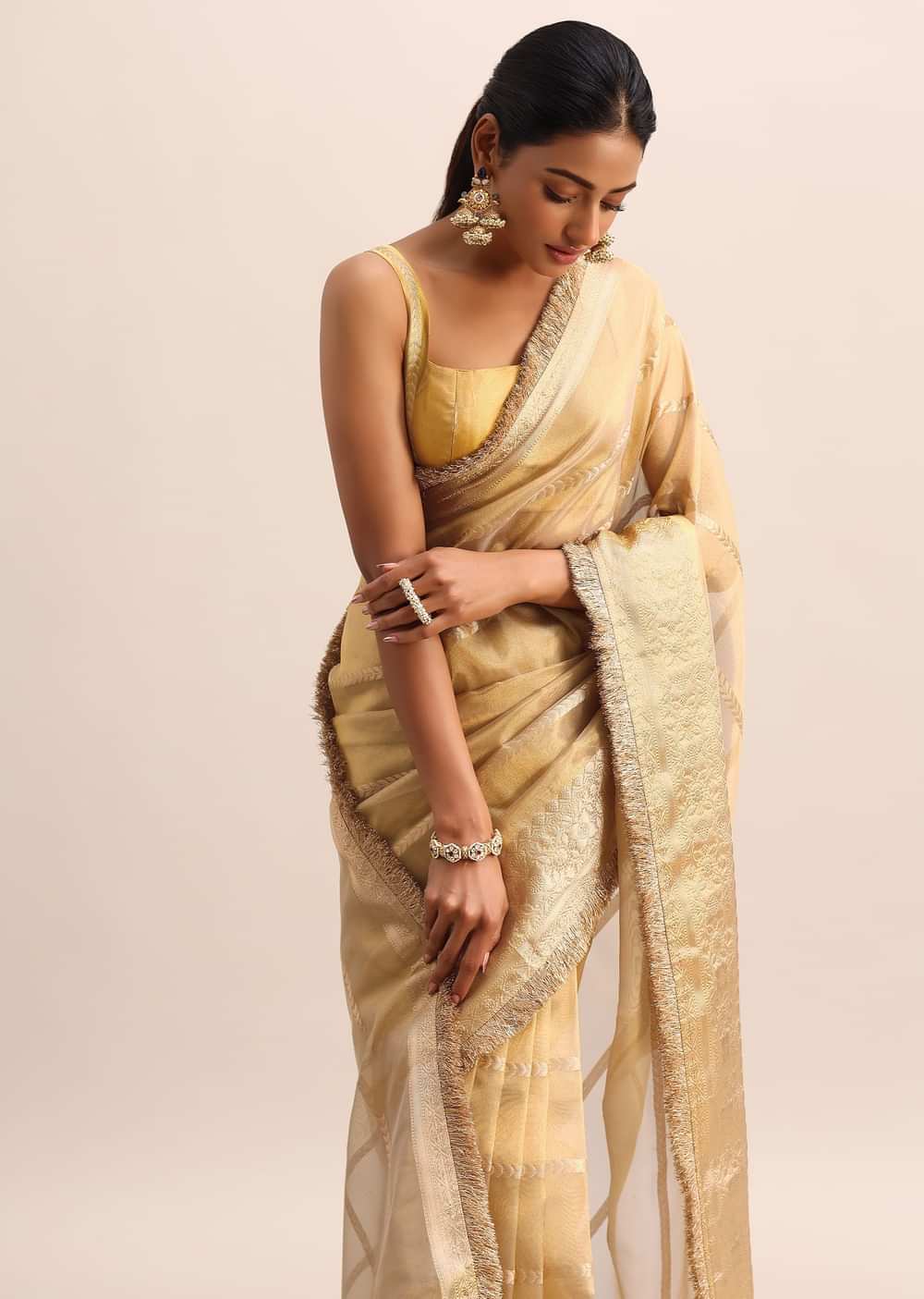 Gold Silk Saree With Zari Woven Border And Zari Frill With Unstitched Blouse