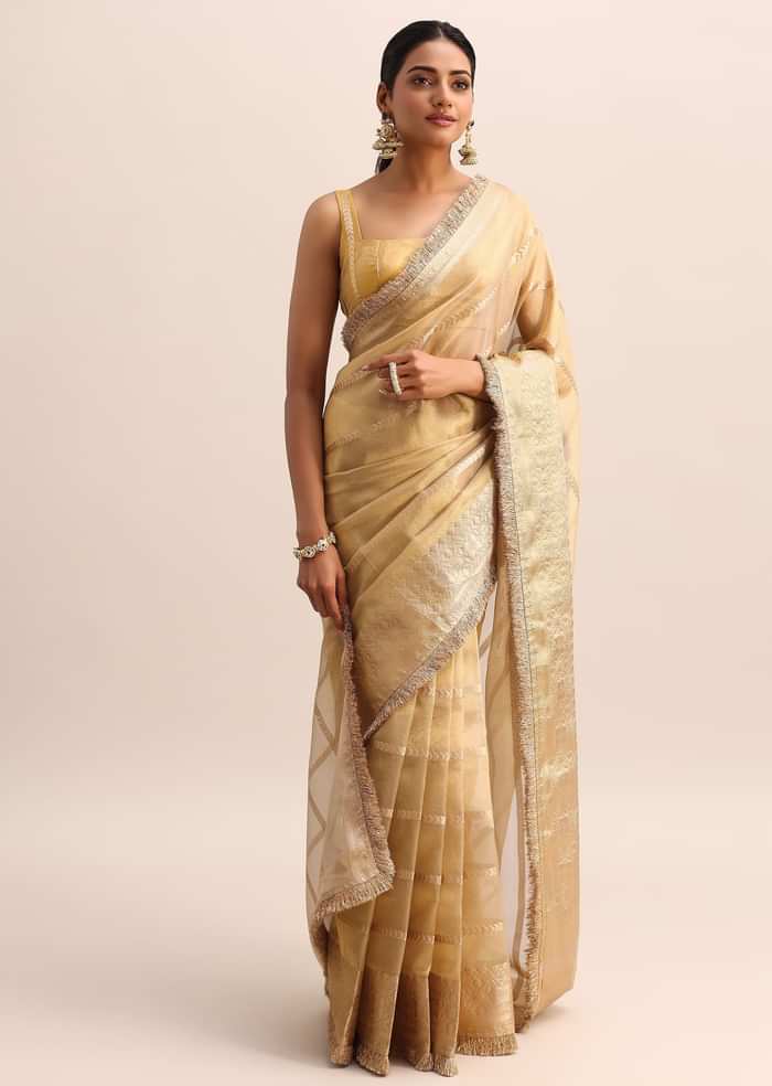 Gold Silk Saree With Zari Woven Border And Zari Frill With Unstitched Blouse