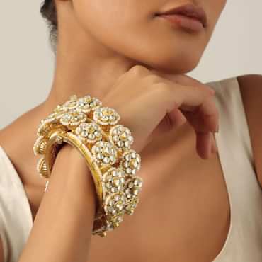Gold Tone Kundan Bangle With Pearls And Floral Motifs