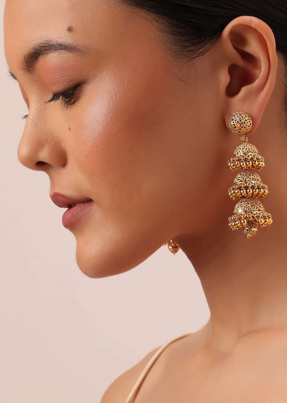 Gold Tone Temple Necklace With Layered Earrings