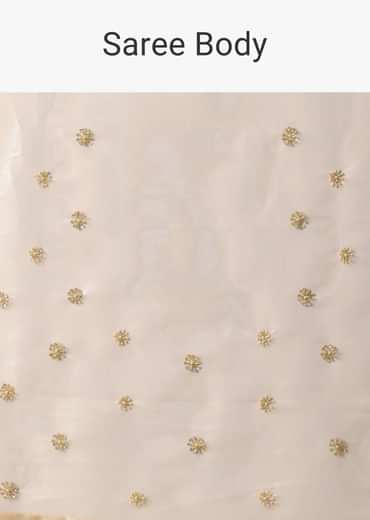 Gold Toned Foil Saree Fabricated In Tissue With Cut Dana Embellished Borders