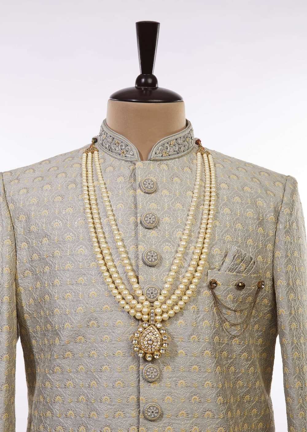 Gold Toned Multi Layered Pearl Mala With Kundan Centre Piece