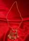 Golden sleek chain party wear necklace with  triple layer pendant adorn in semi precious stone only on Kalki