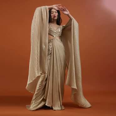 Mocha Brown Gown With A Pre-Pleated Dhoti Skirt Area And Royal Cape Sleeves- NOOR 2022