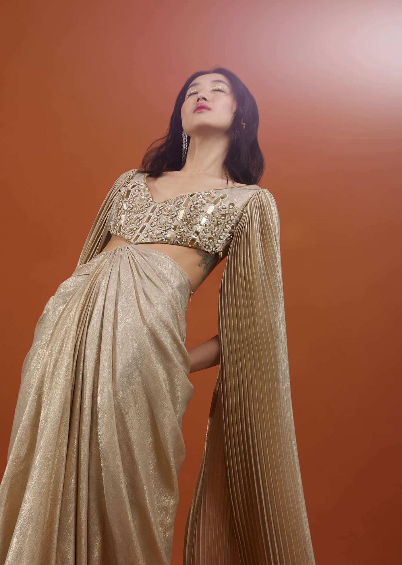 Mocha Brown Gown With A Pre-Pleated Dhoti Skirt Area And Royal Cape Sleeves- NOOR 2022
