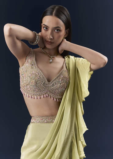 Green Crepe Ready Pleated Saree With Intricate Embroidery