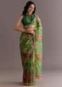 Green Organza Saree With Floral Print And Embellished Border