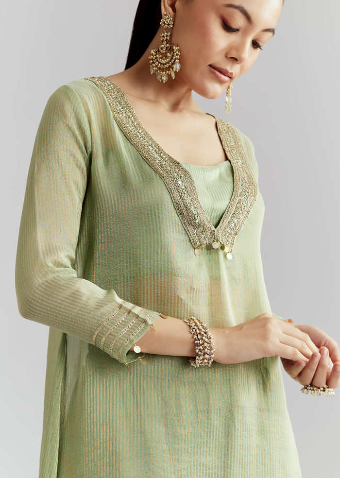 Green Tissue Kurta Set With Intricate Embroidery