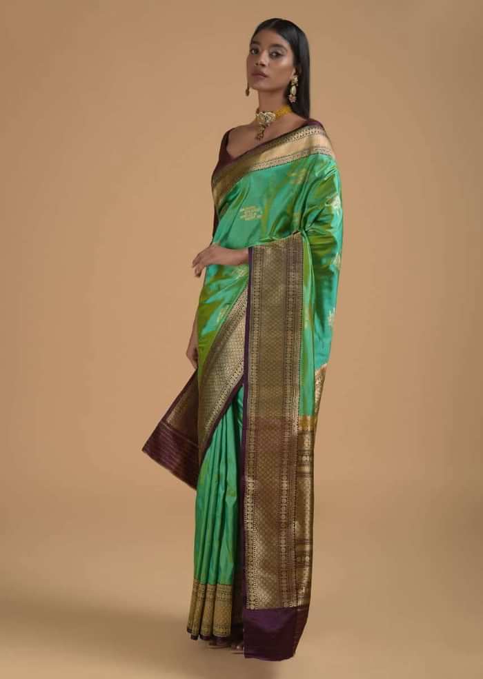 Green Two Toned Pure Handloom Saree In Silk With Woven Text Motifs And Purple Border