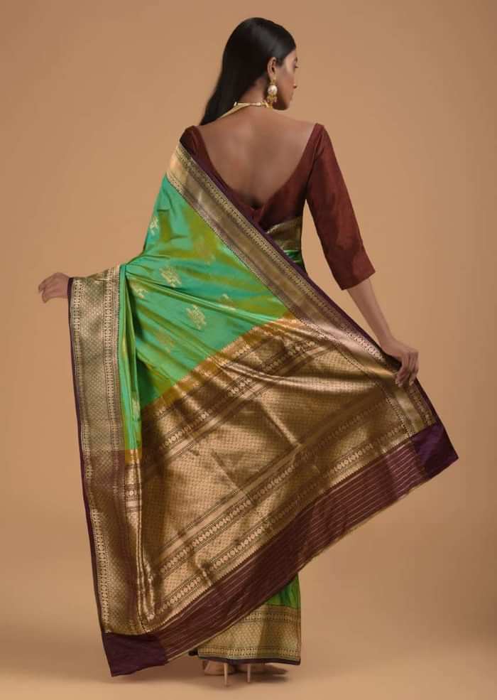 Green Two Toned Pure Handloom Saree In Silk With Woven Text Motifs And Purple Border