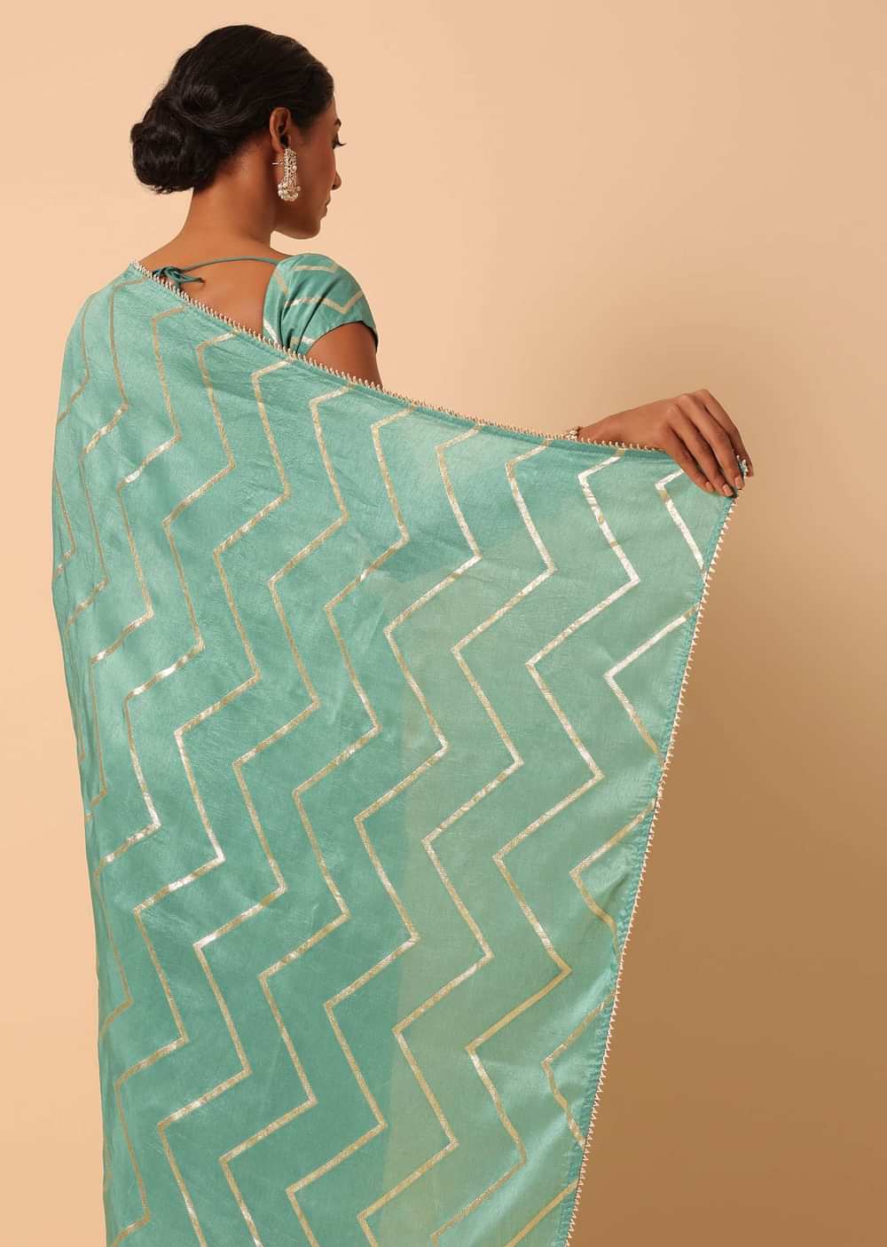 Green Dola Silk Saree With Zig Zag Lurex Work And Unstitched Blouse Piece