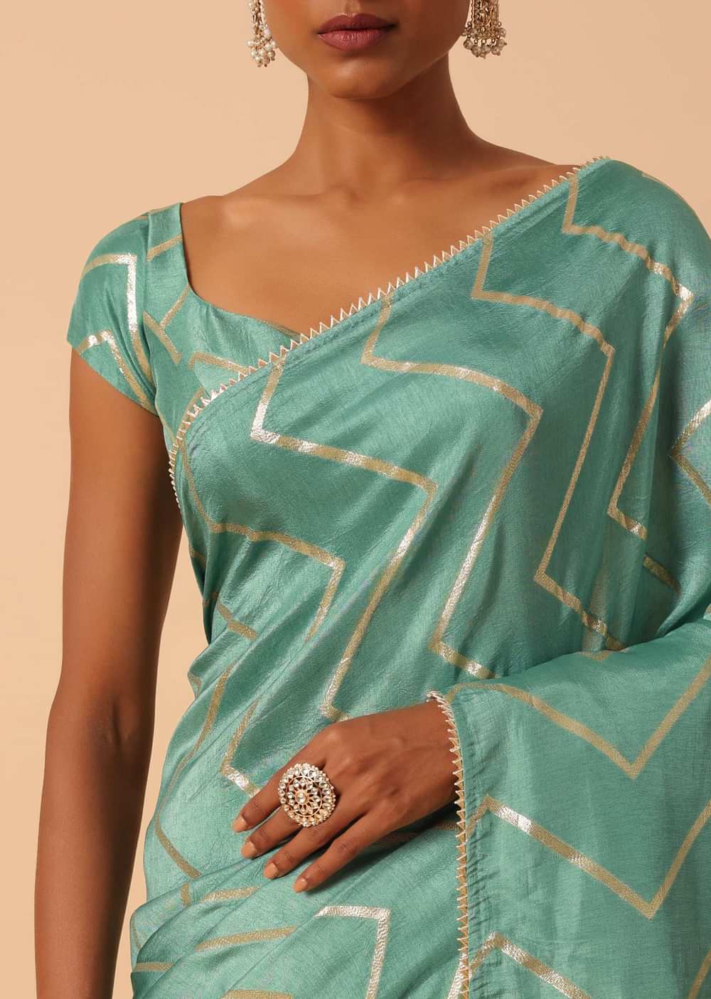 Green Dola Silk Saree With Zig Zag Lurex Work And Unstitched Blouse Piece