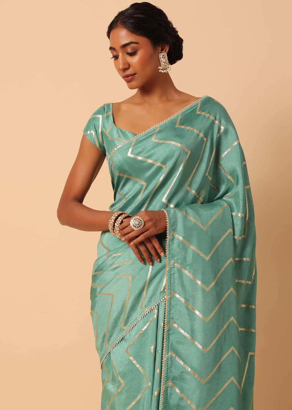 Green Dola Silk Saree With Zig Zag Lurex Work And Unstitched Blouse Piece