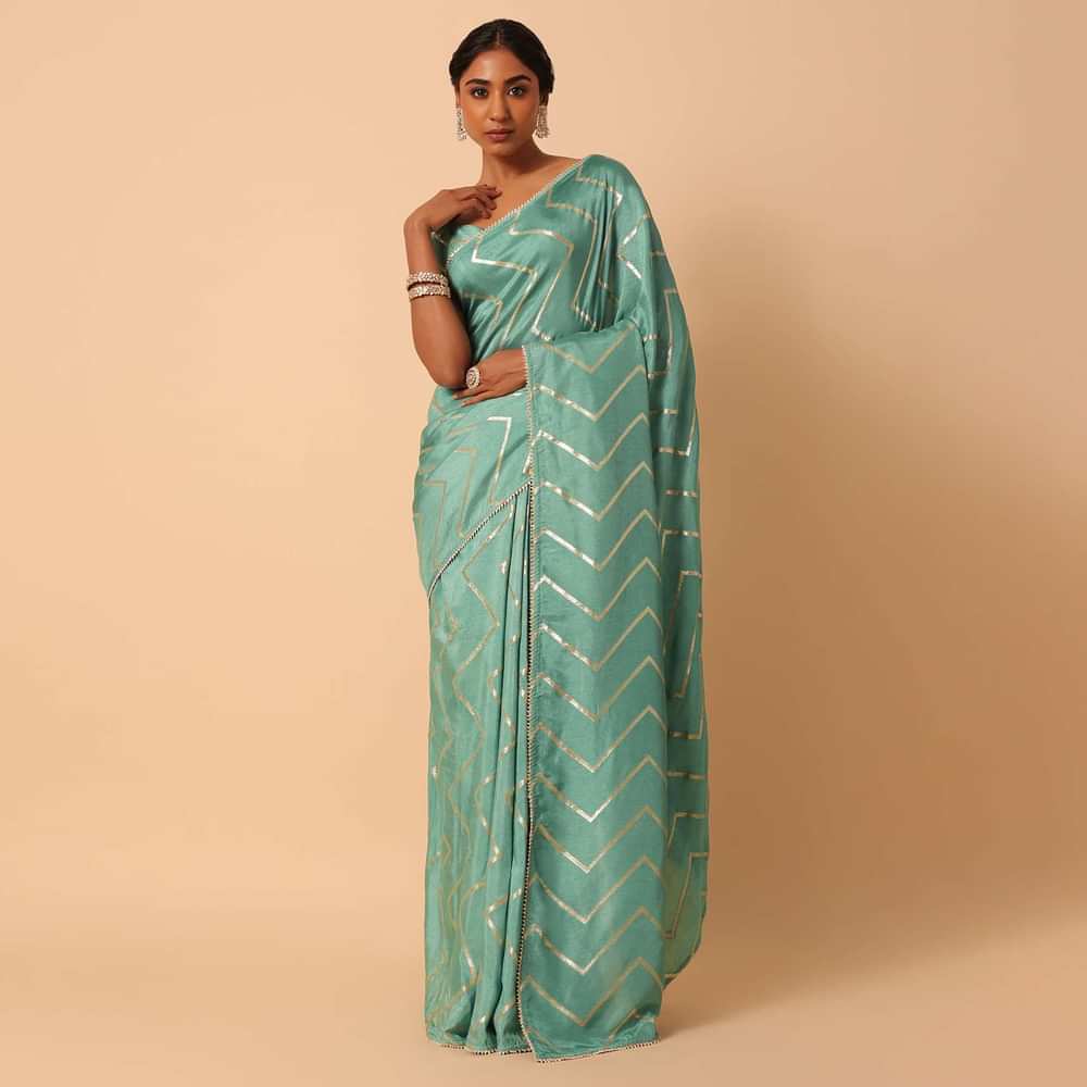 Green Dola Silk Saree With Zig Zag Lurex Work And Unstitched Blouse Piece