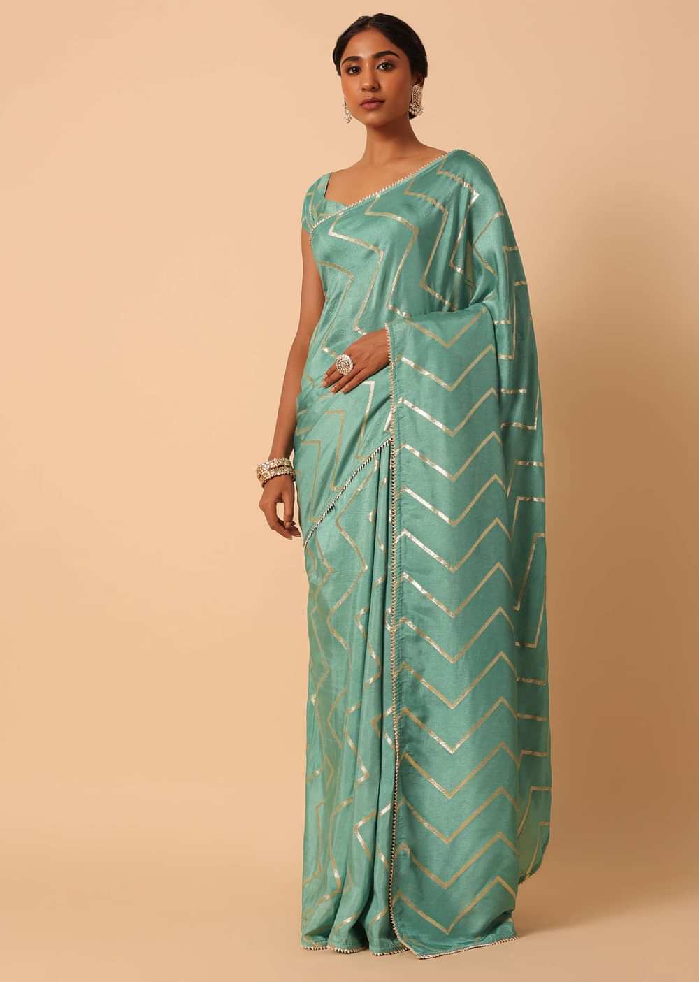 Green Dola Silk Saree With Zig Zag Lurex Work And Unstitched Blouse Piece