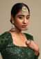 Green Jhumkas With Carved Floral Mina Work, Kundan And Dangling Colorful Bead Fringes