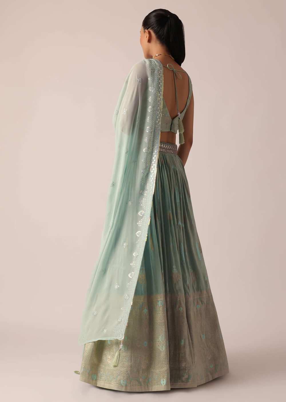 Green Lehenga Set In Brocade Silk With Floral Buttis