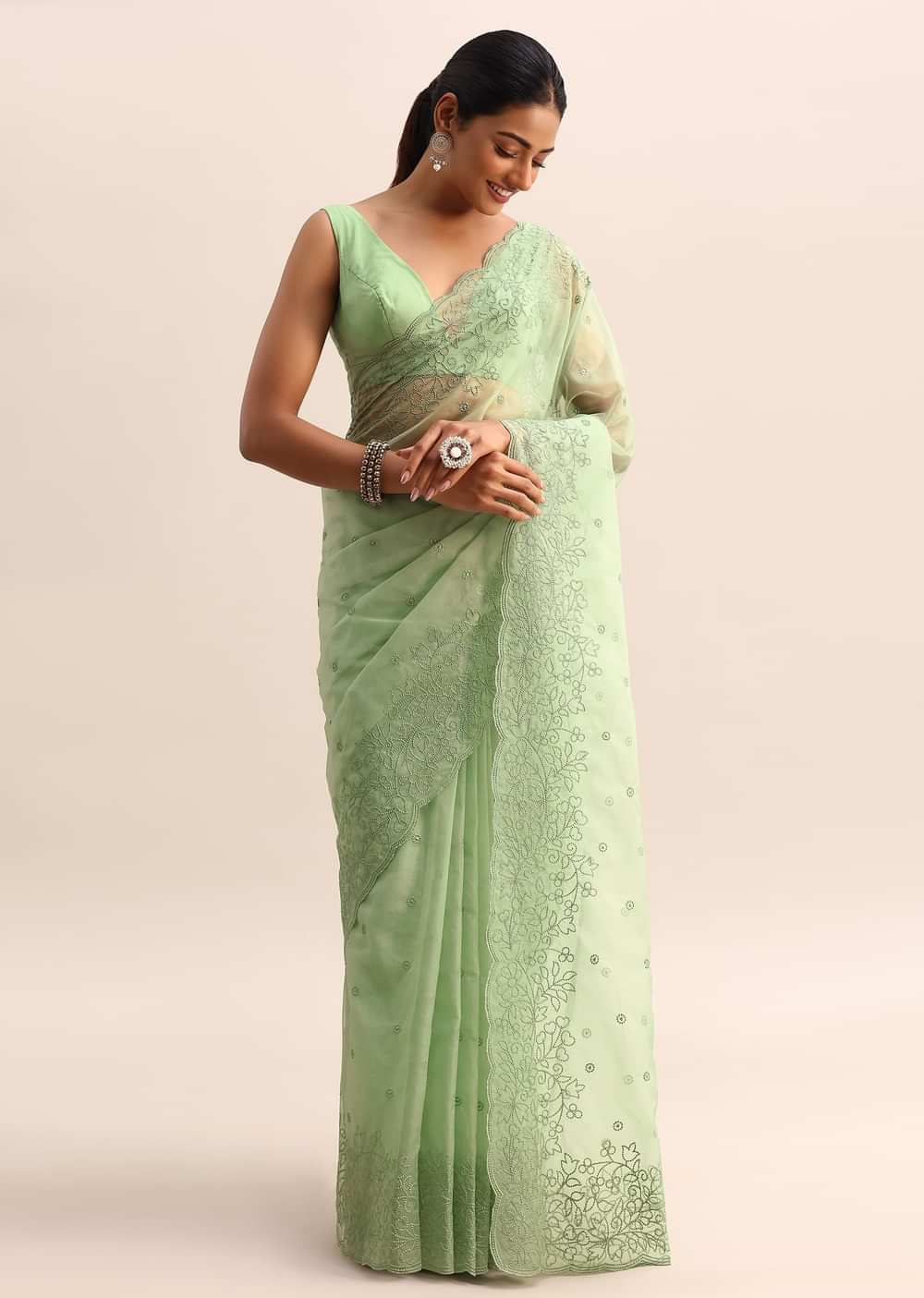 Green Organza Saree With Floral Thread Work Border And Unstitched Blouse