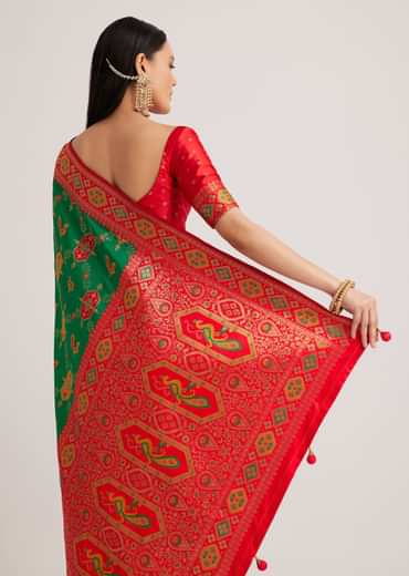 Green Silk Woven Ikat Motif Saree With Constrat Pallu