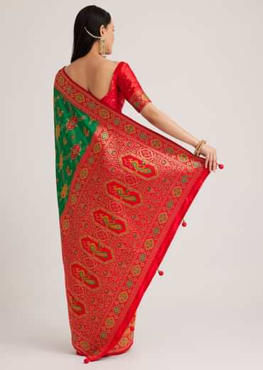 Green Silk Woven Ikat Motif Saree With Constrat Pallu