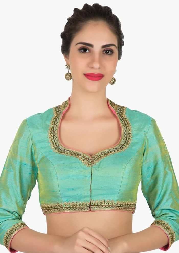 Green stitched blouse in raw silk featuring the zari embroidery work