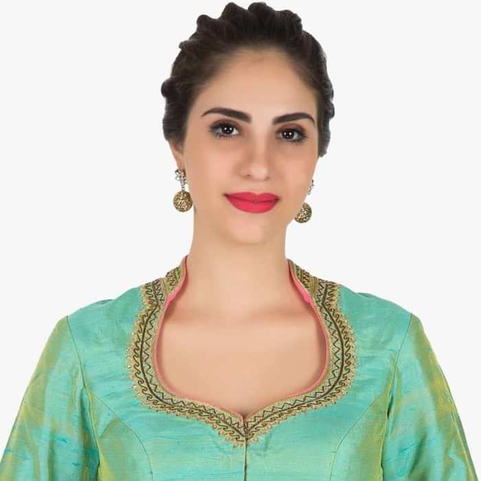 Green stitched blouse in raw silk featuring the zari embroidery work
