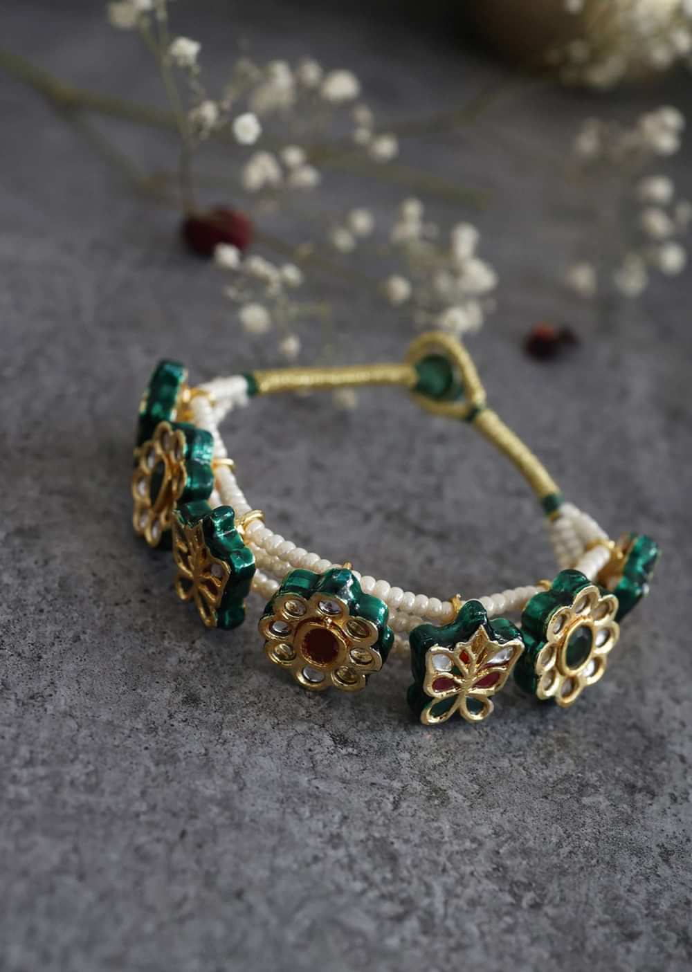 Green Toned Gold Plated Kundan Paunchi Bracelet In Silver Alloy