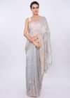 Grey linen saree with embroidered butti and border only on Kalki