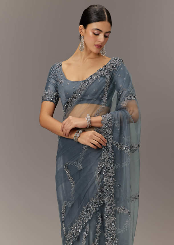 Grey Net Saree With All Over Heavy Embroidery And Net Blouse