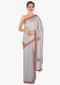 Grey saree in silk with zardosi, moti and resham butti along the border only on Kalki