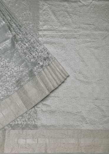 Grey South Silk Saree With Abstract Zari Border And Unstitched Blouse Fabric