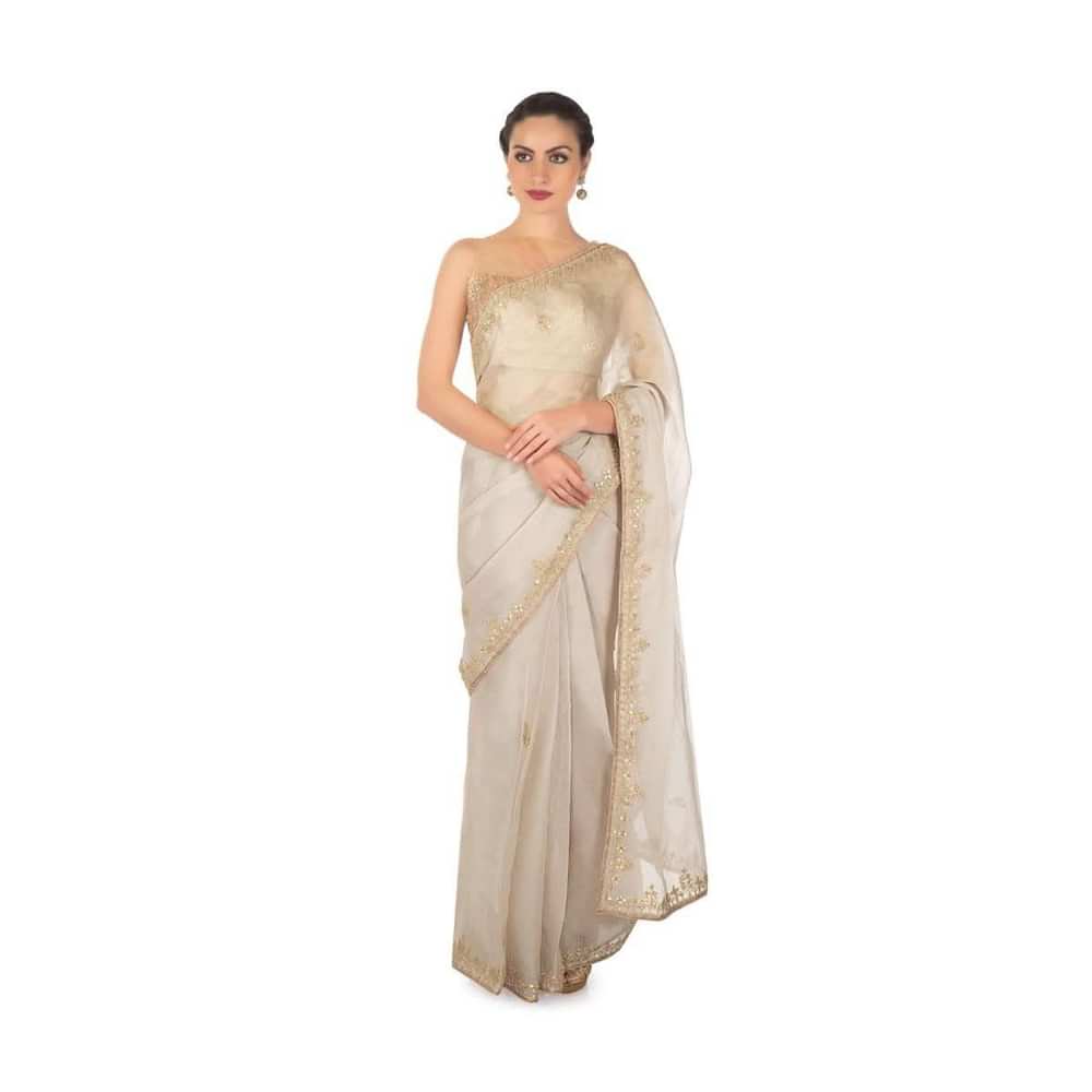 Grey tissue silk saree in gotta patch and motif embroidery only on Kalki