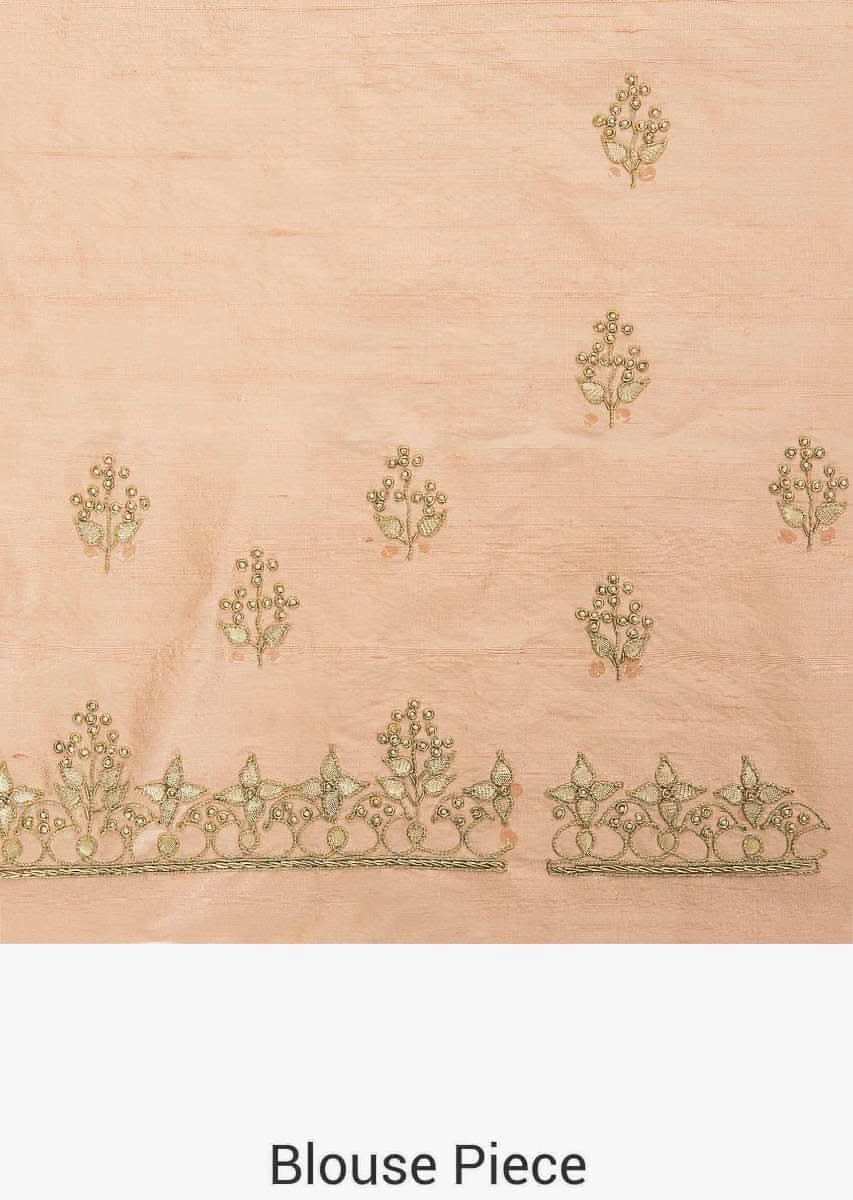 Grey tissue silk saree in gotta patch and motif embroidery only on Kalki