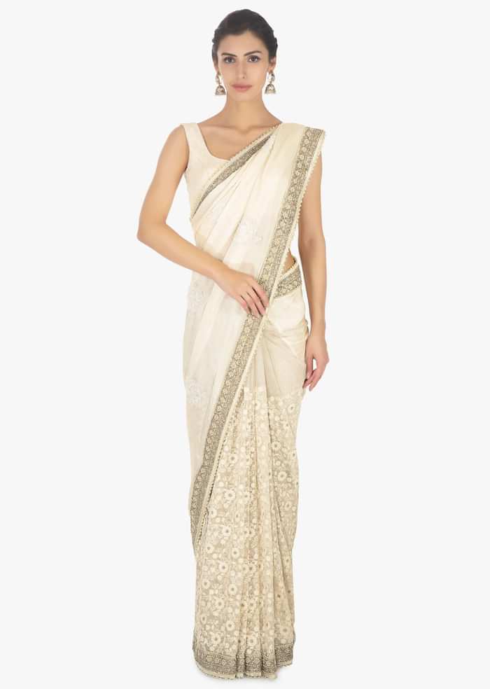 Half and half off white saree in chiffon and net only on Kalki