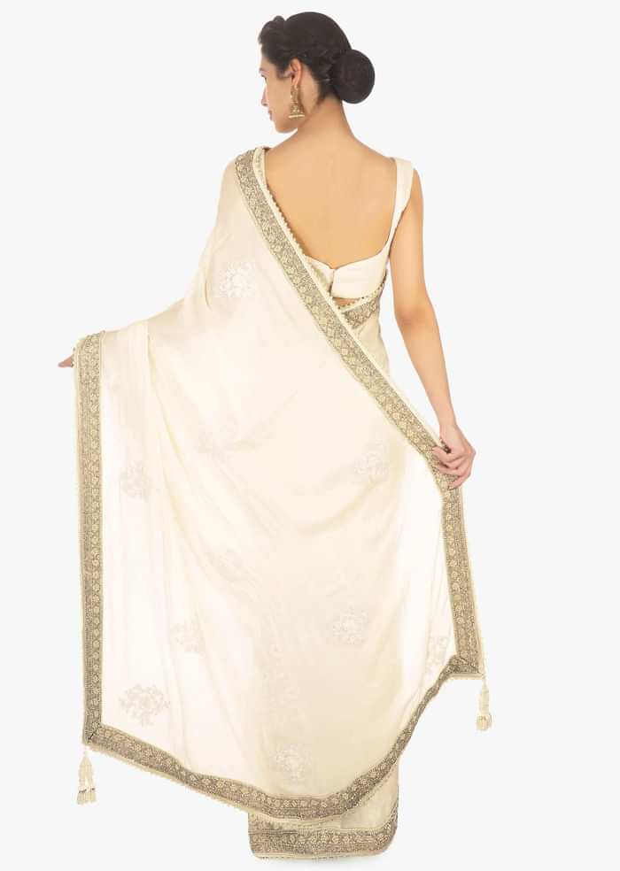 Half and half off white saree in chiffon and net only on Kalki