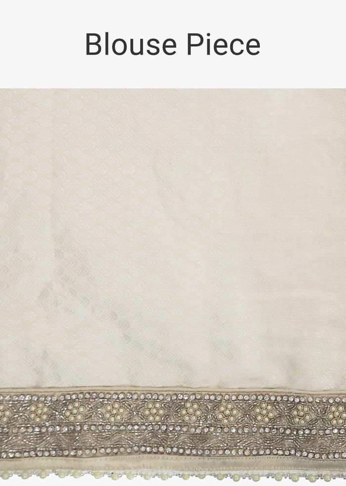 Half and half off white saree in chiffon and net only on Kalki