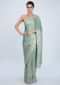 Heavy embroidered pista green satin saree  only on kalki