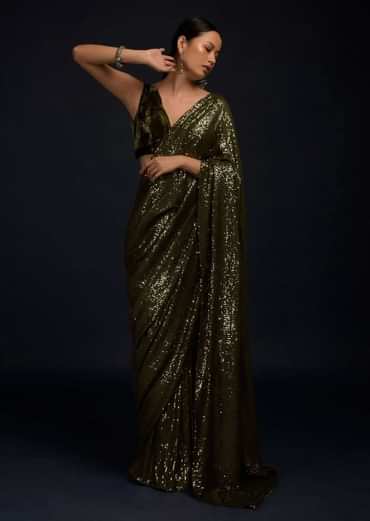 Henna Green Ready Pleated Saree Embellished In Sequins With A Matching Velvet Blouse With Plunging Neckline