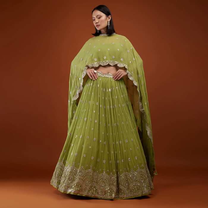 Pista Green Embroidered Lehenga In Georgette With Cape