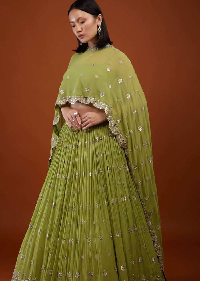 Pista Green Embroidered Lehenga In Georgette With Cape