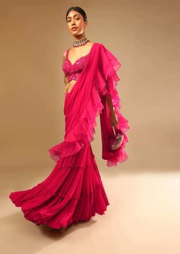 Hot Pink Crop Top Sharara Suit With An Attached Ruffle Draped And An Hand Embroidered Leaf Motifs