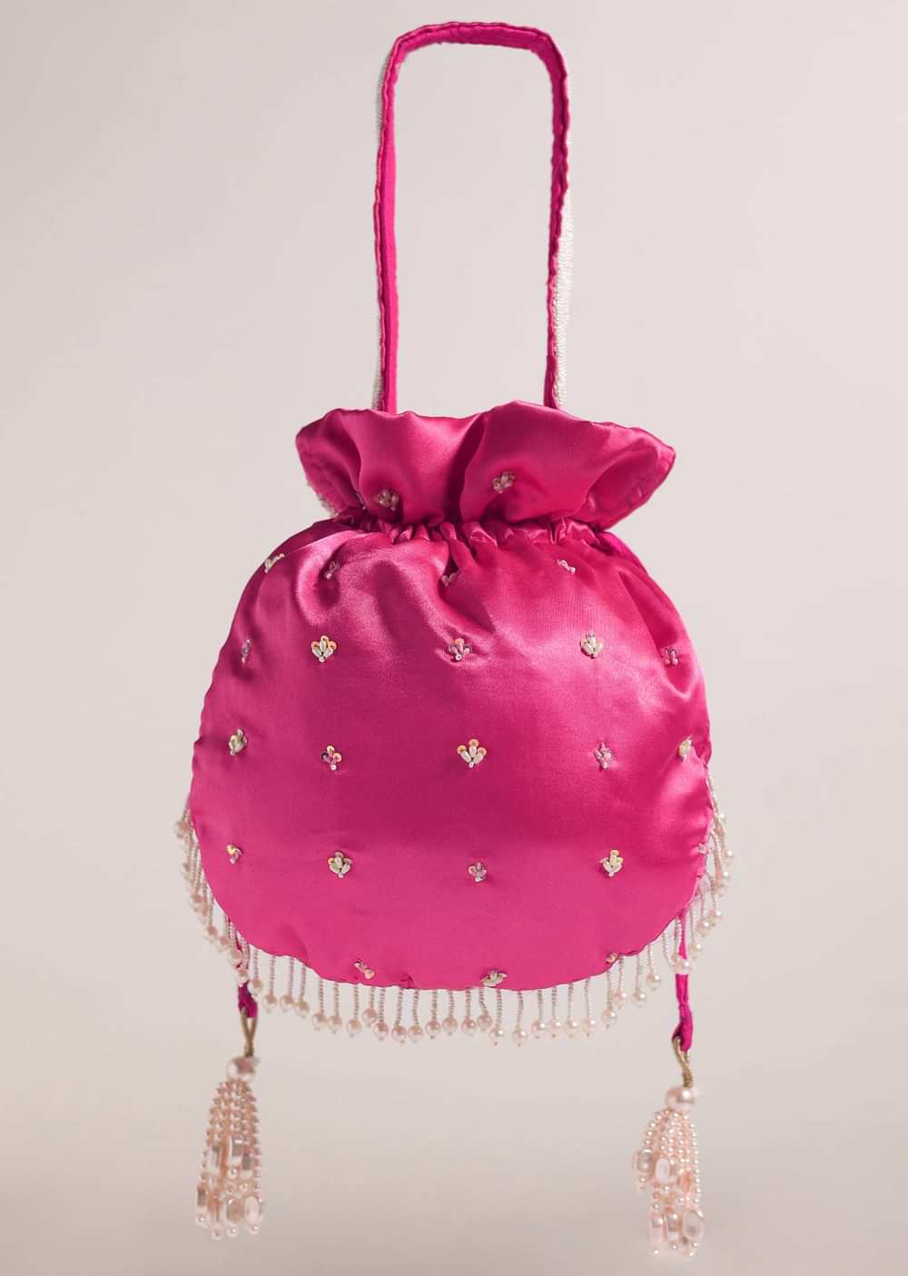 Hot Pink Festive Potli In Raw Silk With Motif Details