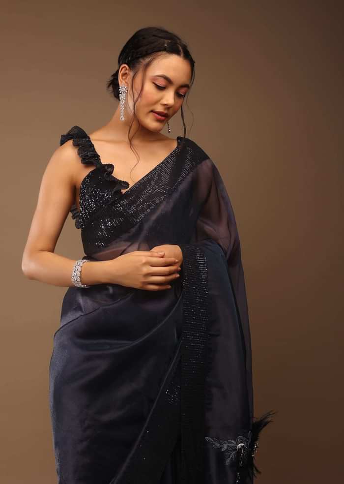 Insignia Blue Saree With A Sleeveless Ruffled Crop Top In Sequins Embroidery