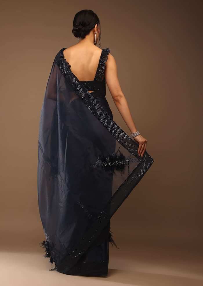 Insignia Blue Saree With A Sleeveless Ruffled Crop Top In Sequins Embroidery