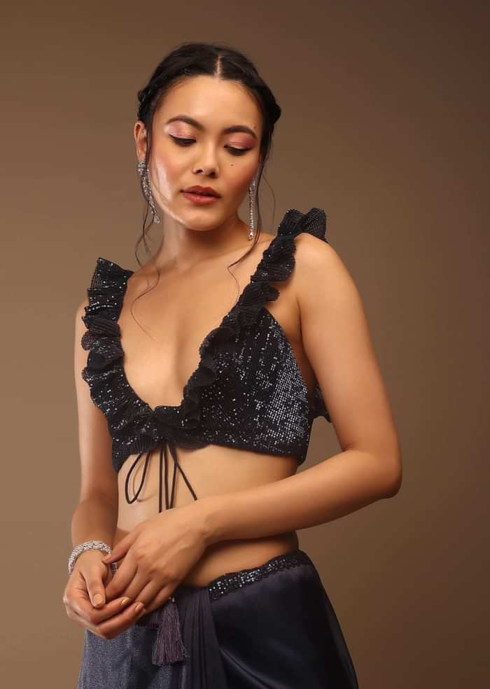 Insignia Blue Saree With A Sleeveless Ruffled Crop Top In Sequins Embroidery