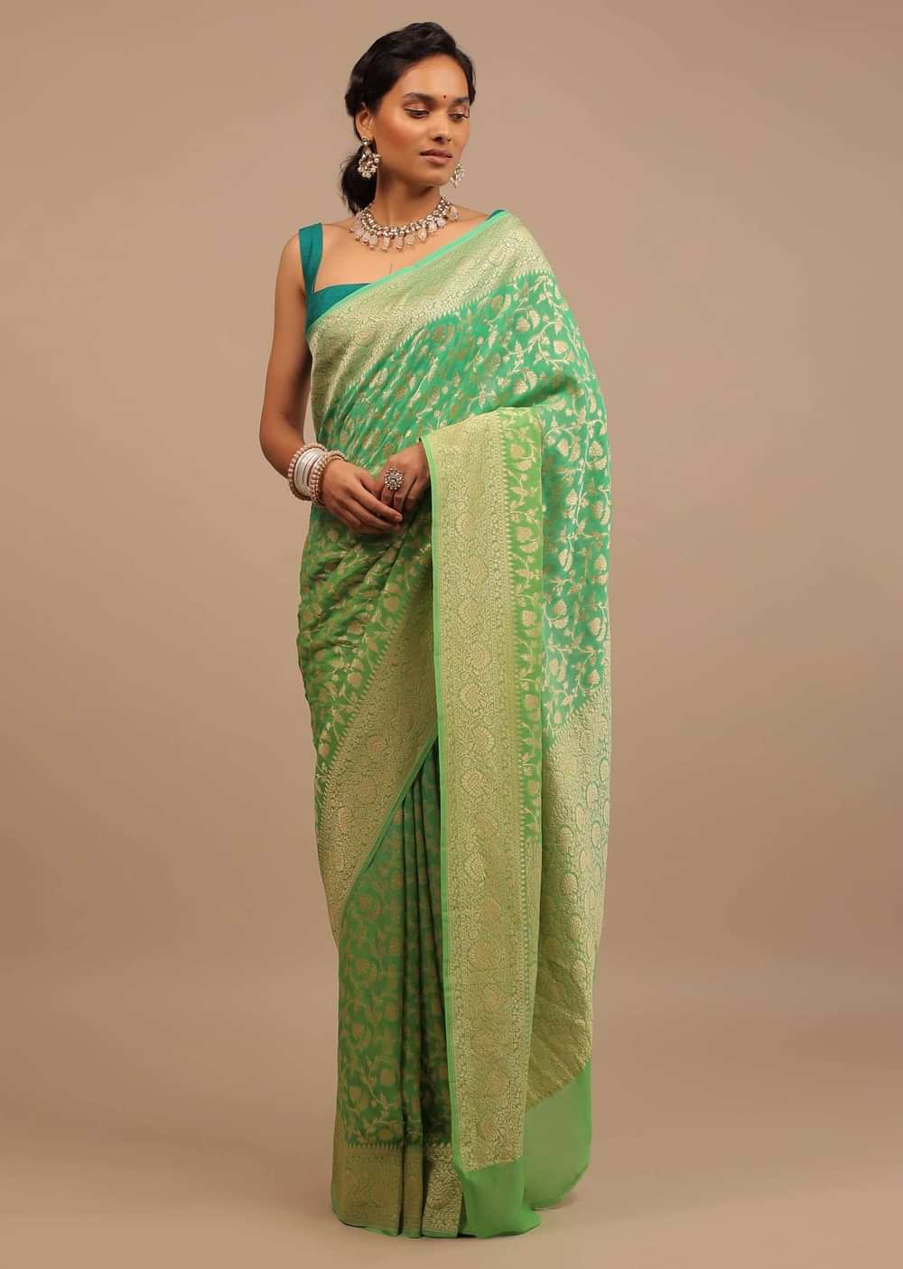 Mint Green Saree With Jaal Work On The Border And Pallu