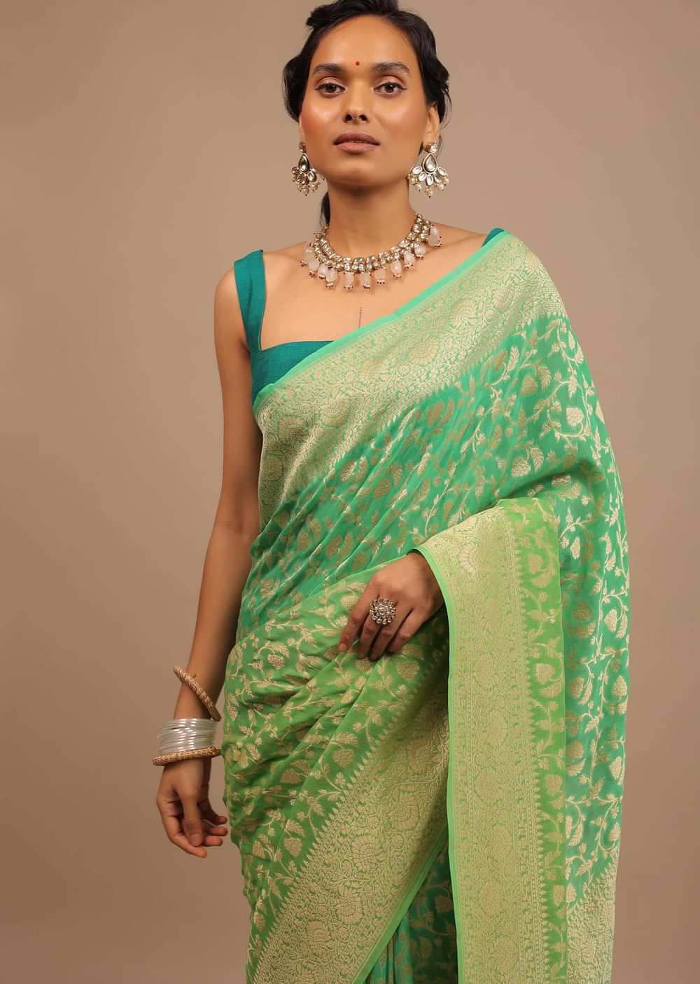 Mint Green Saree With Jaal Work On The Border And Pallu